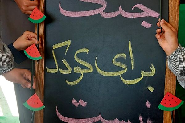 حمایت دانش‌آموزان دبستان کودک مسلمان شهرستان قرچک از کودکان مظلوم غزه