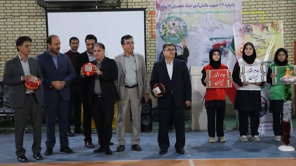روشن شدن مشعل جام اقتدار ایران در آیین یادبود ۳۴ دانش‌آموز شهید بوشهر