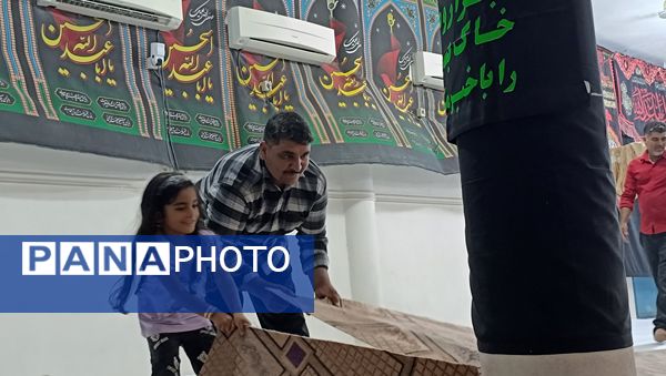 حسینیه حضرت ابوالفضل(ع) در استقبال از ماه محرم سیاه پوش و غبارروبی شد