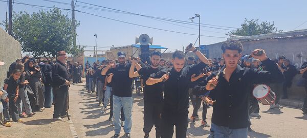 عزاداری ظهر عاشورا در روستای حسن آباد بلهر 