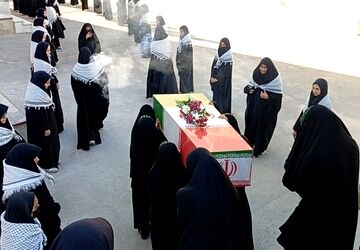 استقبال باشکوه از پیکر شهید گمنام در هنرستان حضرت زهرا (س) شهرستان بن
