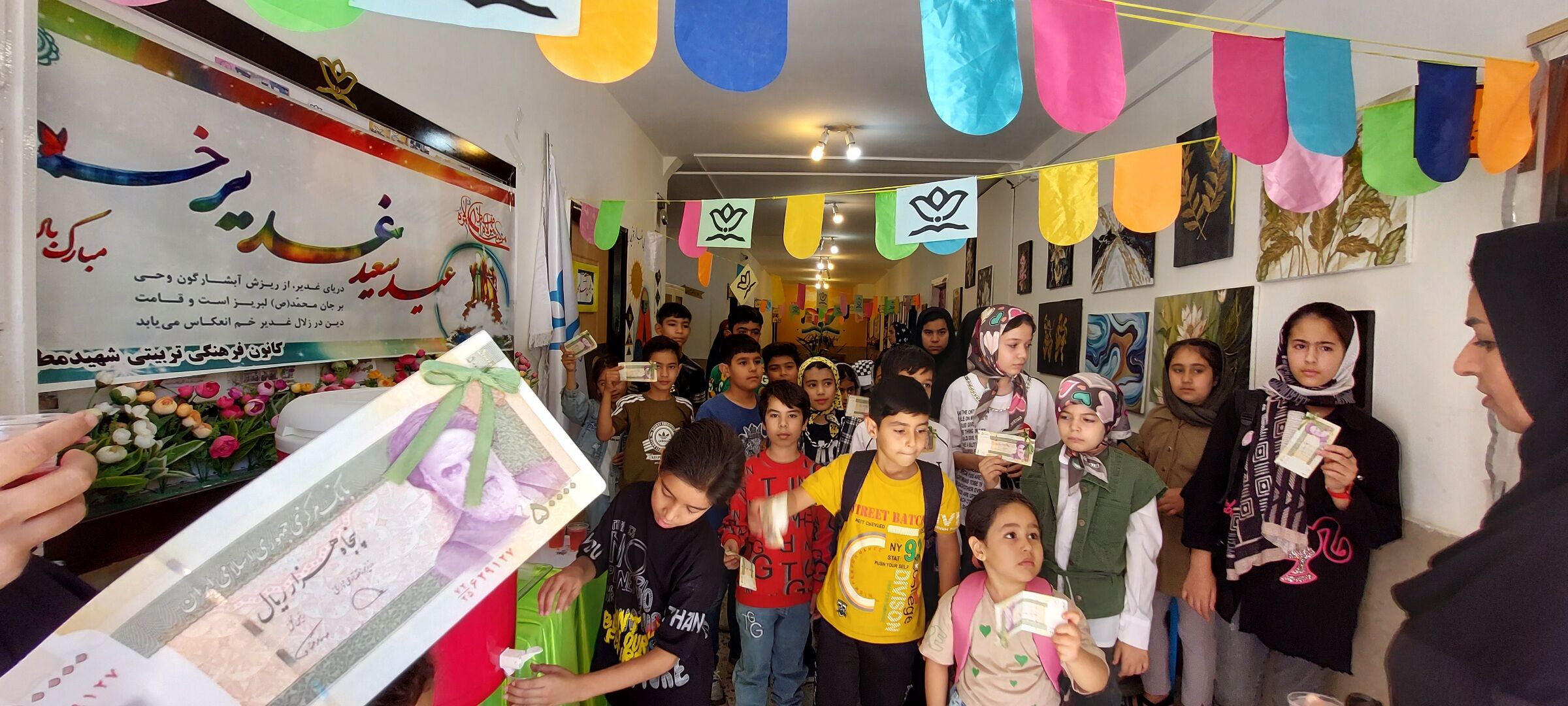 جشن عید غدیر وتقدیر از دانش آموزان توسط کانون فرهنگی هنری شهید مطهری شهر آشخانه