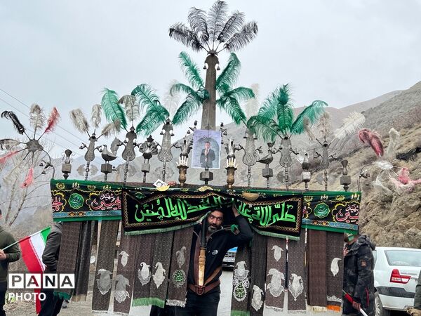 تشییع پیکر شهید دانشمند محمدرضا کیا بر دستان مردم کرج 