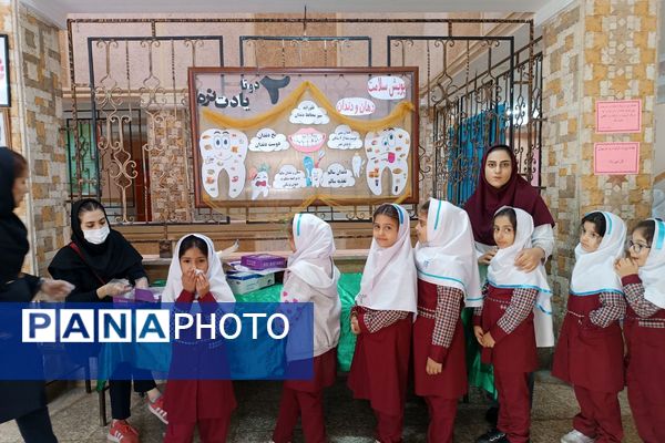 اجرای طرح وارنیش فلوراید برای دانش‌آموزان آموزشگاه باهنر۱ ملارد