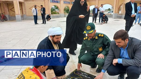 آیین عطر افشانی مزار شهدا در شهرستان فاروج