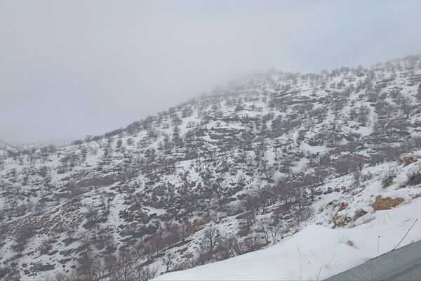 بارش باران و برف زمستانی در روستای کینک