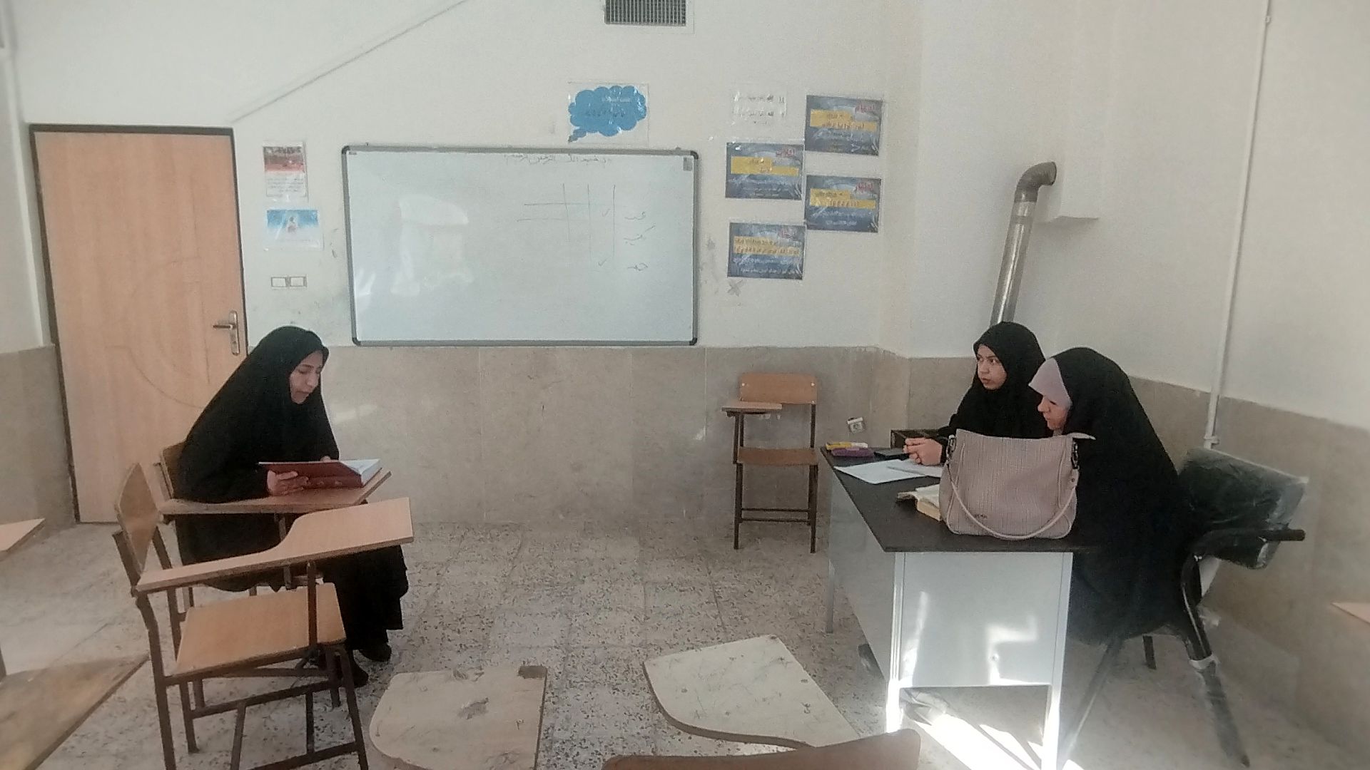 برگزاری آزمون قرآن و عترت در رشته حفظ و قرائت در آشخانه