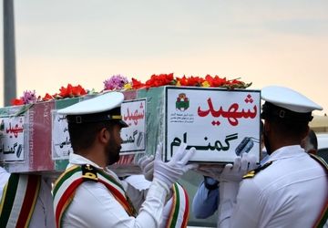 استقبال از 5 شهید گمنام دوران دفاع مقدس در فرودگاه بین‌المللی بوشهر 