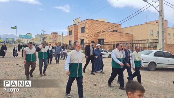 آیین اهتزاز پرچم امام رضا(ع) و رونمایی از دیوارنگاره کودکان میناب در شهر کهک