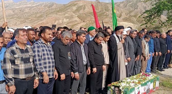 آخرین وداع با شهید اسماعیل احمدی در میان اشک و احترام