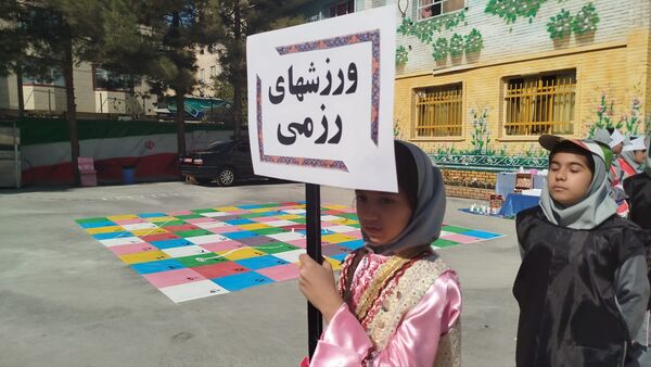 مشعل المپیاد ورزشی ناحیه ۷ در دبستان شهدای راه آهن روشن شد