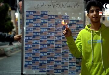 چالش پاره کردن پرچم آمریکا و اسرائیل در بم