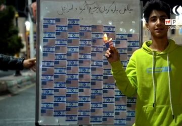 چالش پاره کردن پرچم آمریکا و اسرائیل در بم