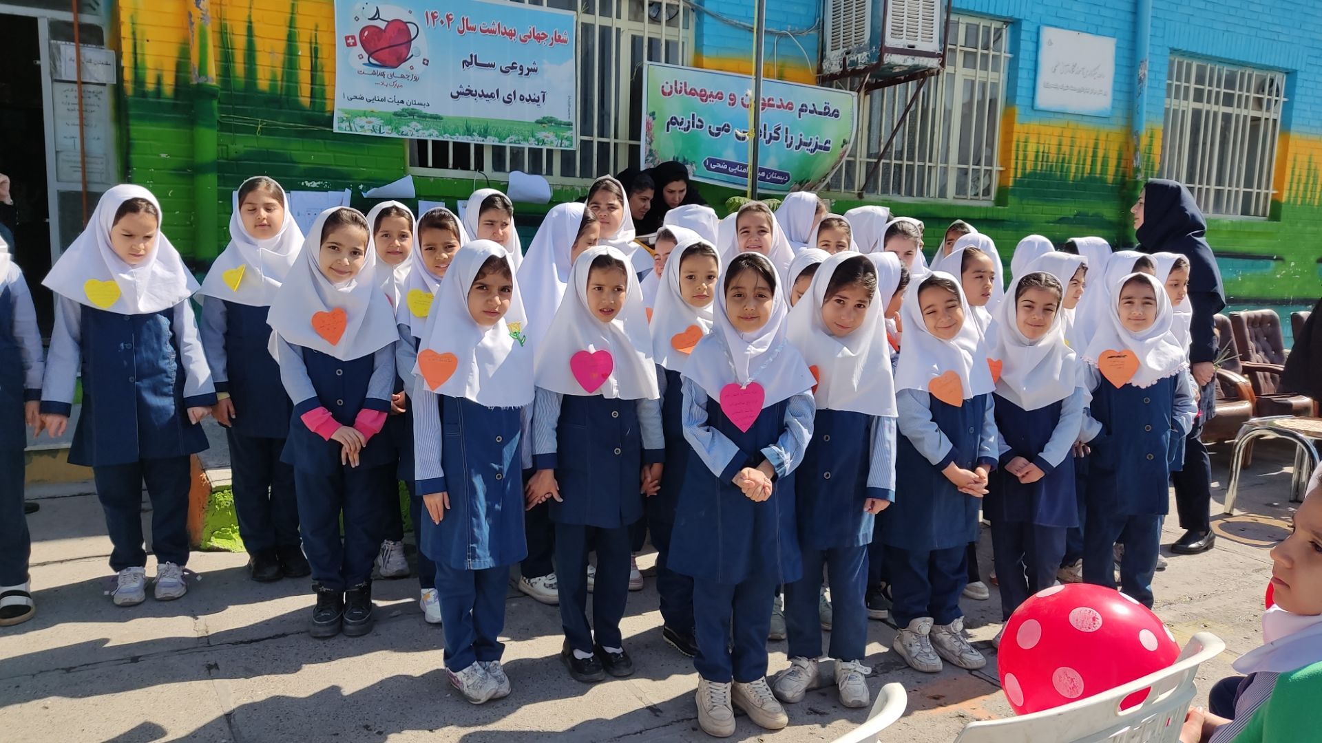 نواختن زنگ سلامت در مدرسه دخترانه ضحی ۱ شهرستان شیروان