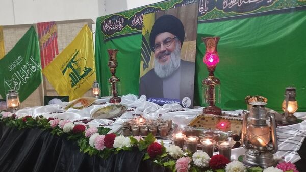 مراسم گرامیداشت شهدای مقاومت و تشیع نمادین پیکر پاک شهید سید حسن نصرالله در خلیل آباد 