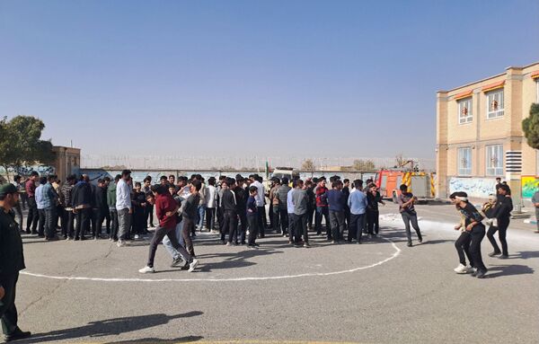 آیین نواختن زنگ پدافند غیرعامل در زاوه