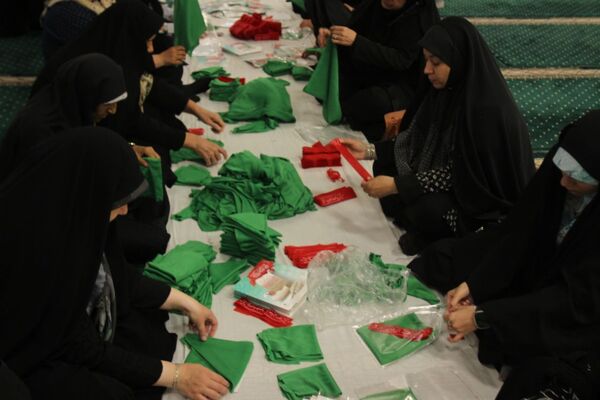 بسته‌بندی لباس همایش شیرخوارگان حسینی زنجان