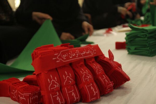 بسته‌بندی لباس همایش شیرخوارگان حسینی زنجان