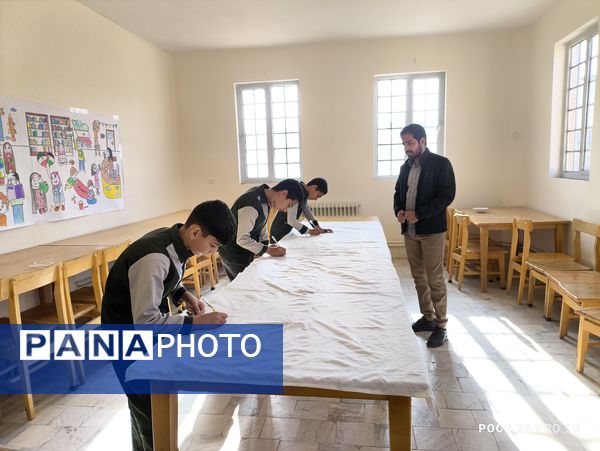 نقاشی همگانی توسط دانش‌آموزان دبستان شهید پسندیده فدافن
