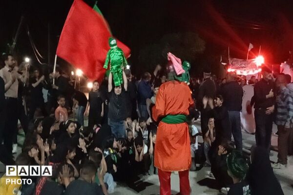 مراسم نمادین آتیش زدن خیمه ها در حسینیه شهدای شهر بار 