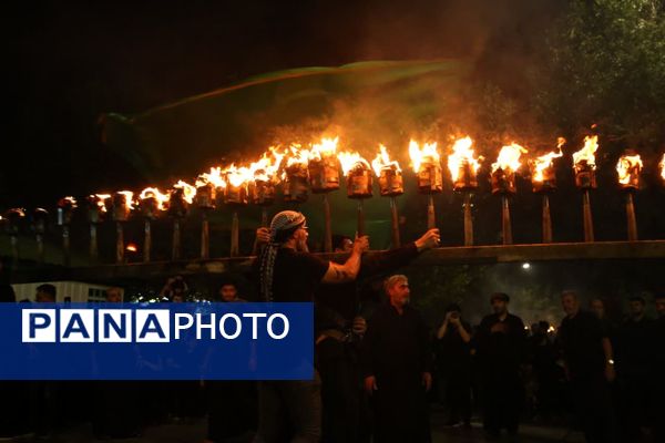 آیین «مشعل گردانی» نجفی‌های مقیم قم