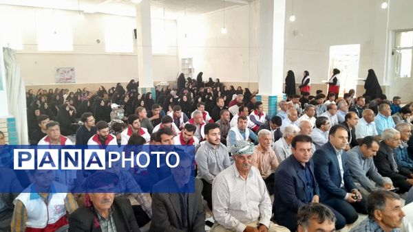 مراسم گرامیداشت شهدای بمباران هوایی شهرستان ایوانغرب