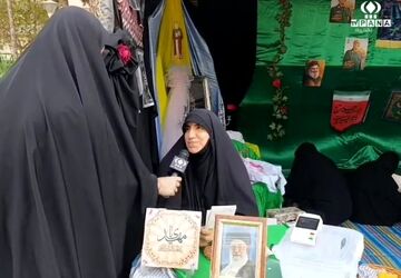 گزارش خبرنگار پانا از غرفه های مسیر پیاده روی اربعین در قم