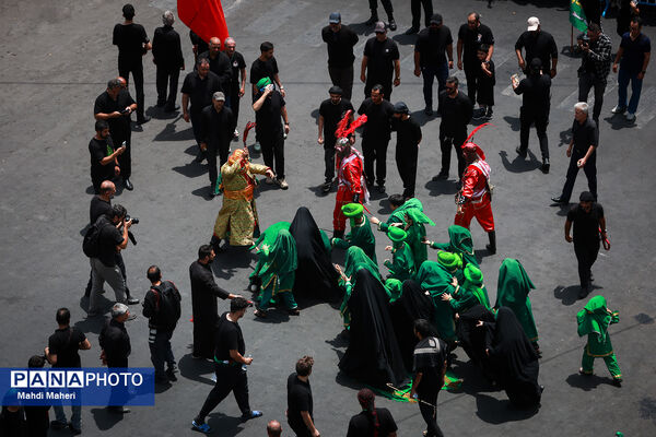 خیمه‌سوزان ظهر عاشورا در چهارراه گلوبندک تهران