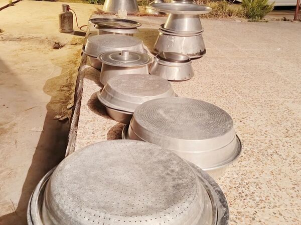 پخت و توزیع نذری در روز تاسوعای حسینی روستای حسن آباد داراب استان فارس