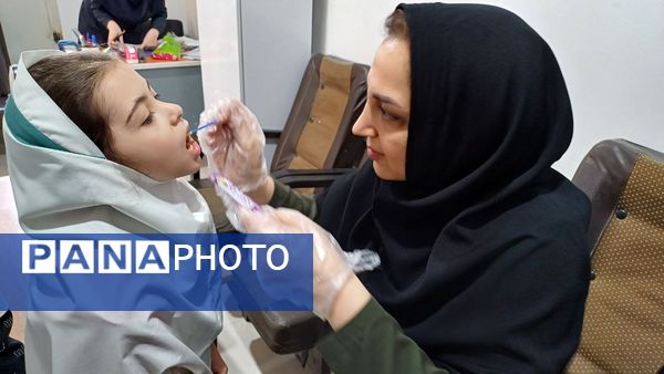 اجرای طرح وارنیش فلوراید در دبستان لطیفه 