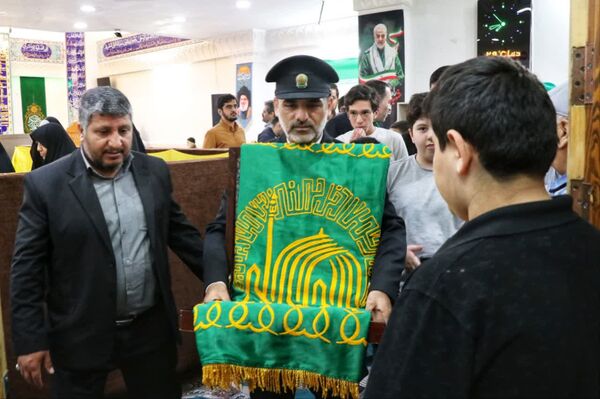 پرچم متبرک امام رضا (ع) در جشن ولادت امام رئوف در مسجد امام حسن عسکری (ع) بجنورد 