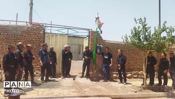 آیین سنتی علم گردانی روستای حسن آباد بلهر  در روز عاشورای حسینی 