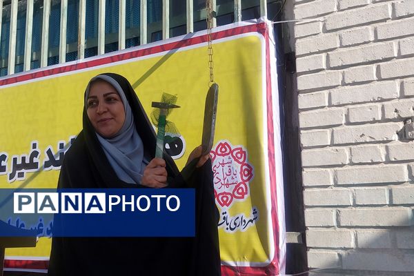 نواختن زنگ پدافند غیرعامل در هنرستان کوثر باقرشهر 