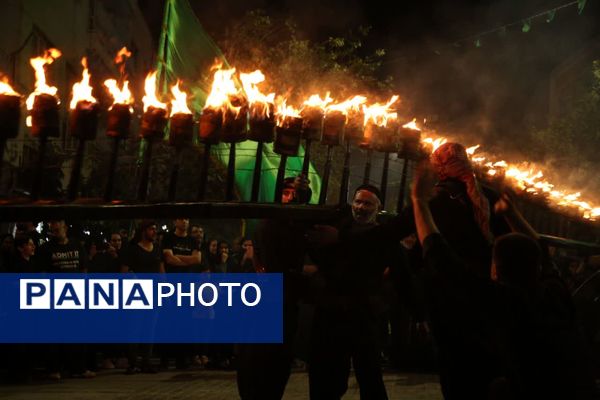 آیین «مشعل گردانی» نجفی‌های مقیم قم