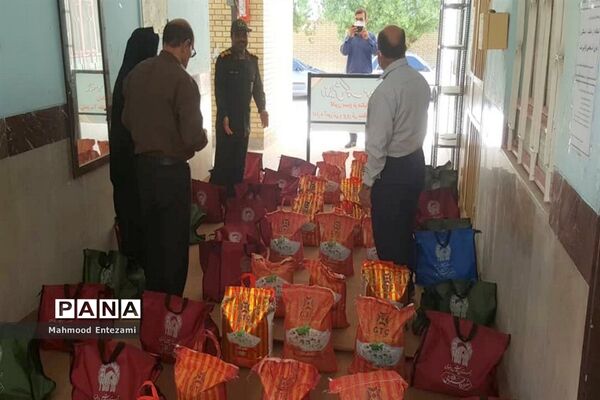 رزمایش کمک مومنانه دانش‌آموزان و فرهنگیان آب پخش