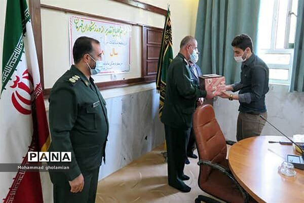تجلیل  از فرزندان قهرمان کارکنان سپاه امام صادق (ع) استان بوشهر