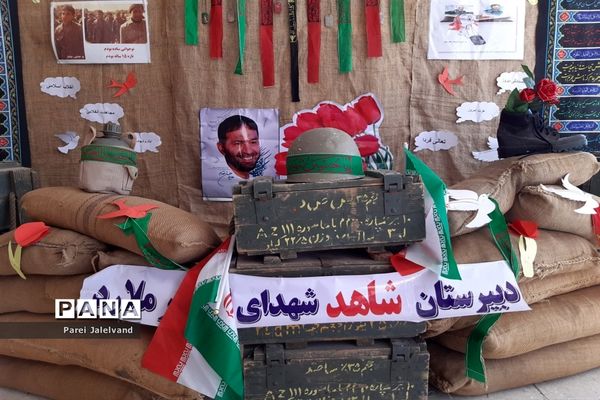 نواختن زنگ ایثار و شهادت  را مدرسه شهدای اقتدار ملارد