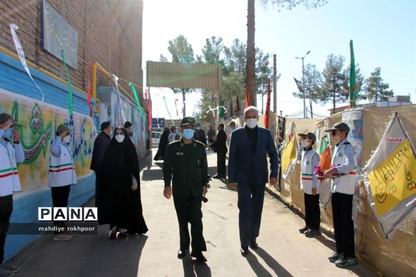 نواختن زنگ ایثار ومقاوت دردبیرستان شیخ هادی هادوی بیرجند