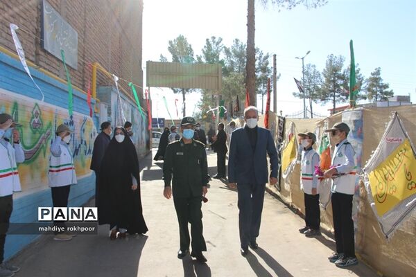 نواختن زنگ ایثار ومقاوت دردبیرستان شیخ هادی هادوی بیرجند