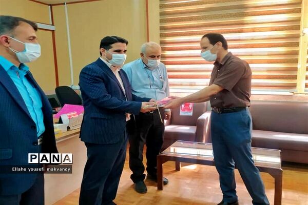 مراسم تجلیل از خانواده های معظم  شهدای فرهنگی  شهرستان امیدیه