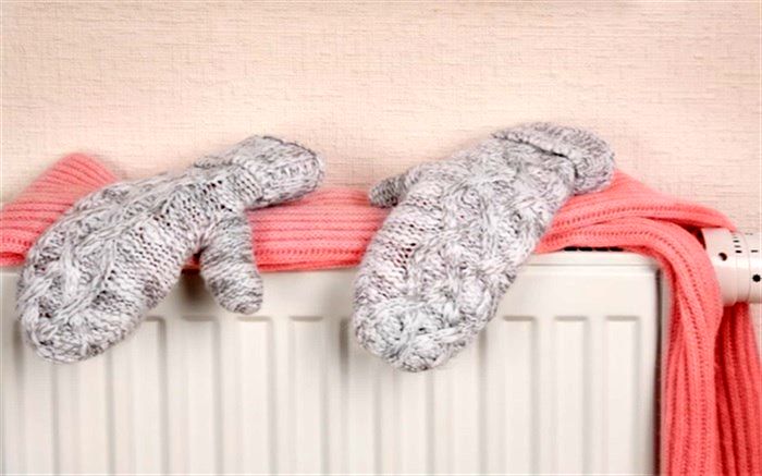 چرا نباید لباس‌ها را روی شوفاژ خشک کرد