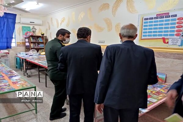 نواختن زنگ هفته بسیج در بندر امام خمینی