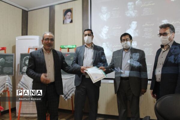 آیین رونمایی از تابلوی تصاویر معلمان شهید ناحیه یک قم