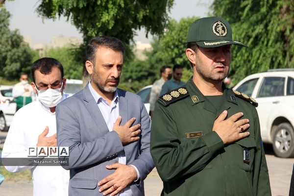 به اهتزاز درآمدن پرچم حرم امام مهربانی‌هادرشهرستان اسلامشهر