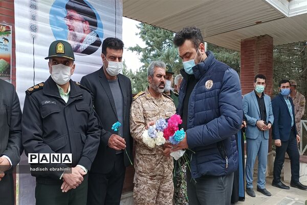 غبارروبی و عطر افشانی گلزار شهدا در گلوگاه