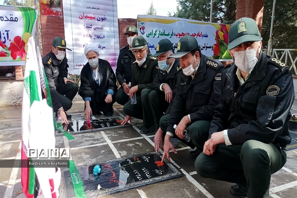 غبارروبی و عطر افشانی گلزار شهدا در گلوگاه
