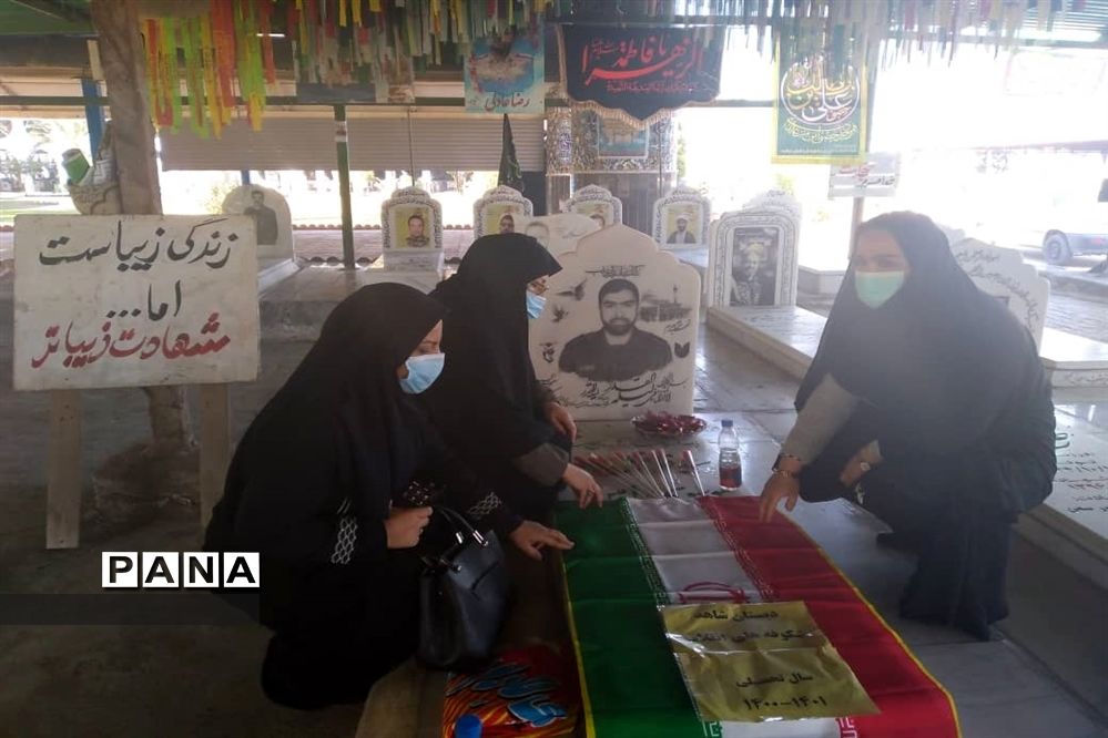 مراسم عطر افشانی و غبار روبی مزار شهدا در اهواز