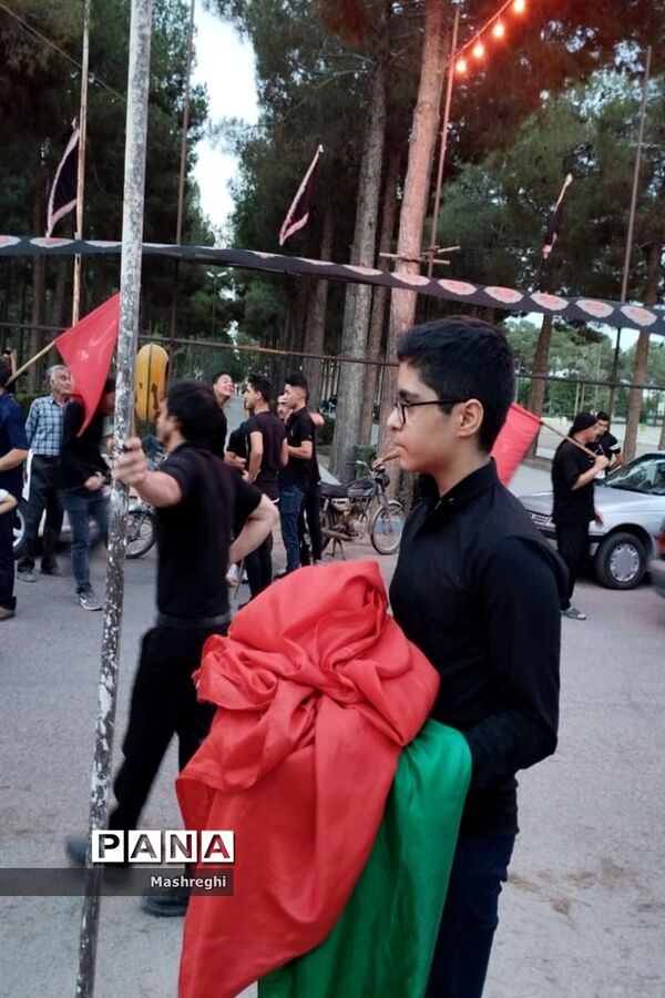 مراسم آیینی پرچم بدستان و بیرق‌داران ندای محرم نوش‌آباد