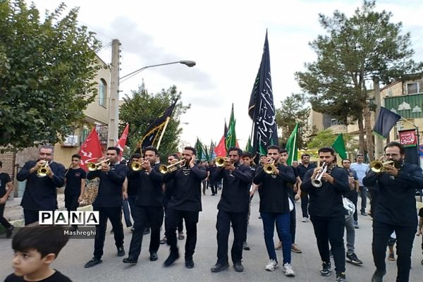 مراسم آیینی پرچم بدستان و بیرق‌داران ندای محرم نوش‌آباد