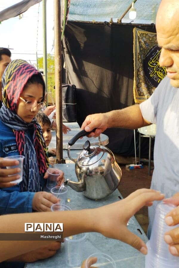 مراسم آیینی پرچم بدستان و بیرق‌داران ندای محرم نوش‌آباد